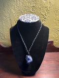 Braided crystal cage necklace