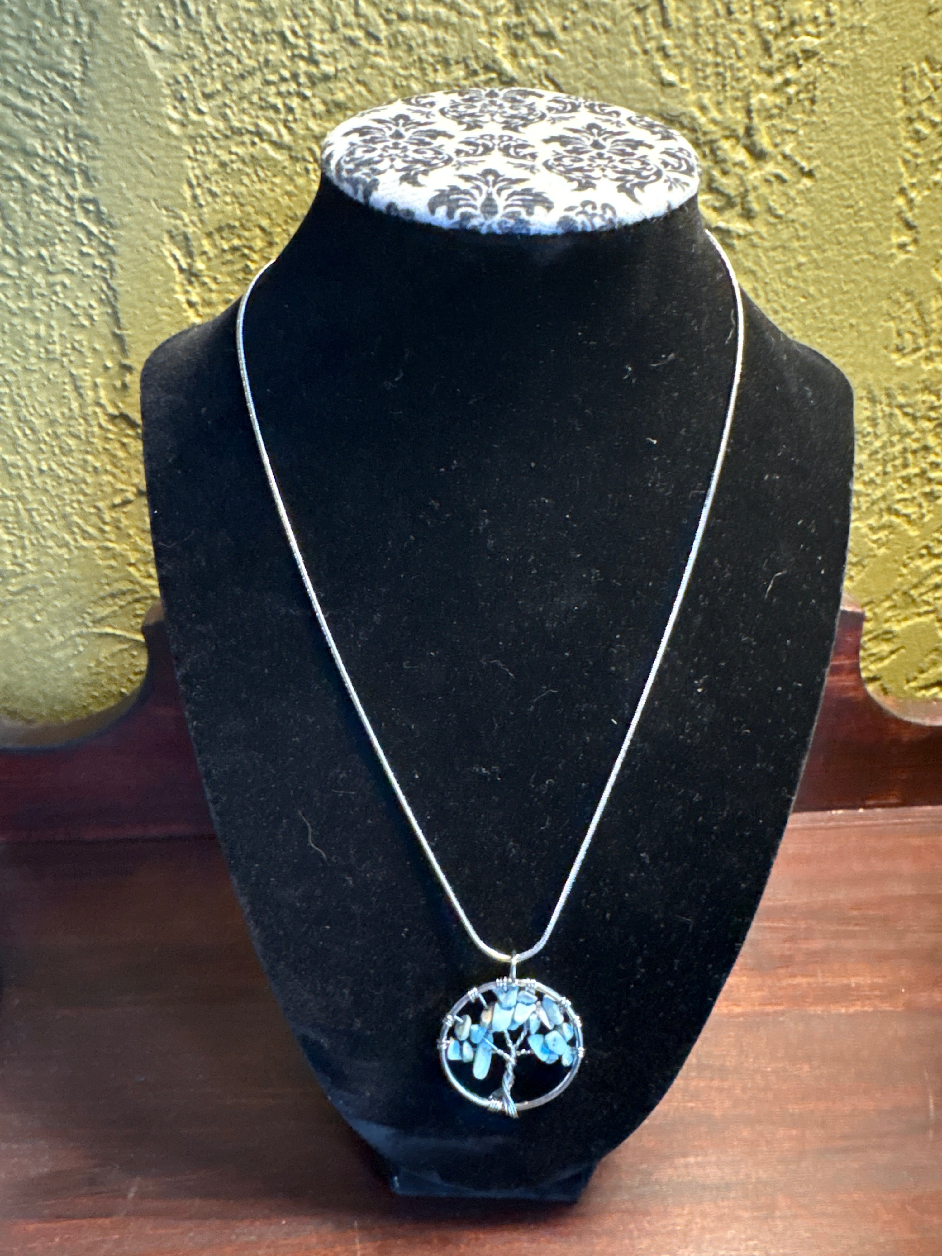 Wire wrapped tree of life on stainless steel chain